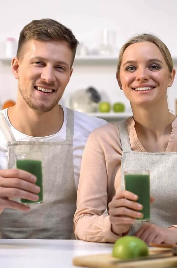 Couple drinking smoothies