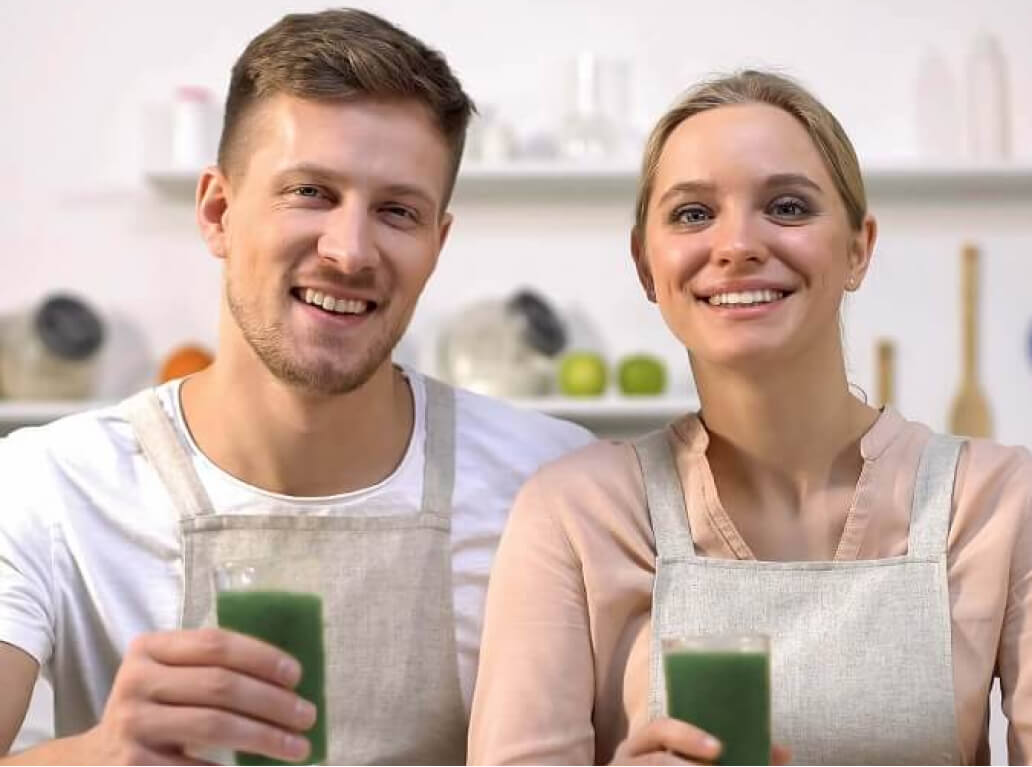 Couple drinking smoothies